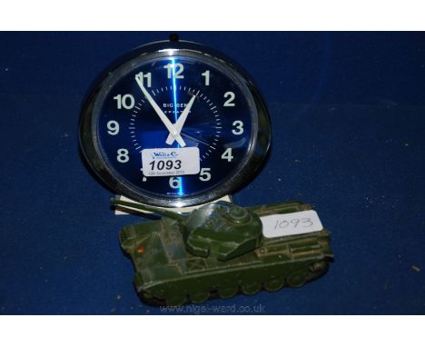 A retro 'Big Ben' alarm Clock and Dinky Centurion Tank.