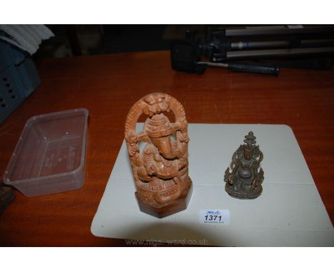 Two Far Eastern Deity statues, one carved from wood of the Hindu God Ganesh and the other a Chinese bronze statue of Black Ja