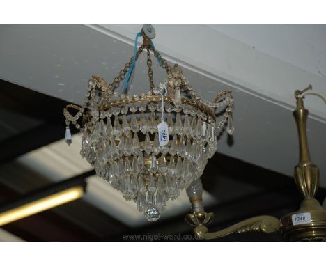An elegant circa 1880 French Lead Crystal and Brass five tier waterfall Chandelier, the hook with three chain supports, circu