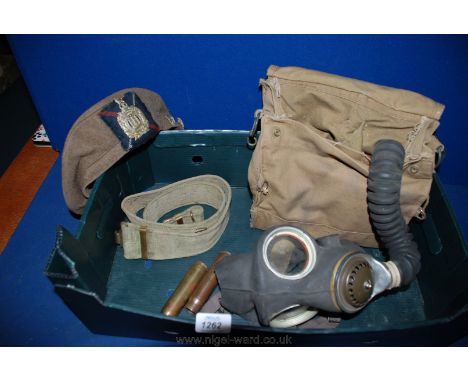 A quantity of WWII items including Gas Mask with original bag, Army Belt Scottish Kings Borders Army Cap with badge and two 2