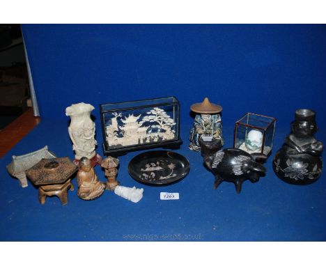 A box of oriental miscellanea including glass cased cork Diorama of trees, bridges and pergola, ceramic figure of a man pruni