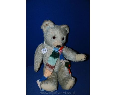 A blue mohair Merrythought Teddy Bear, 15'' tall.