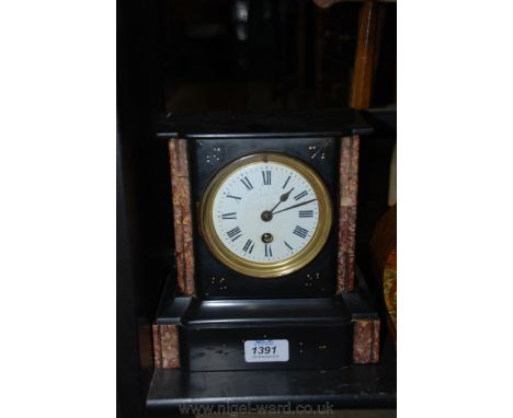 A late 19th c. black marble and onyx Mantle Clock with breakfront top over a central scratch decorated front with painted det