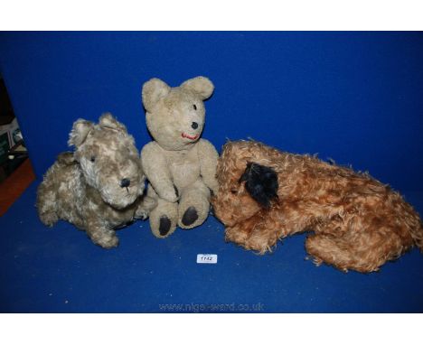 Three soft Toys including a brown dog pyjama case, cream and brown dog and one eyed Teddy bear.