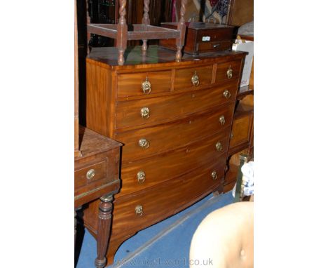 A mid 19th c. bow fronted Chest of three short over four long graduated Drawers having plain top over the seven Pine lined dr