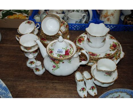 A quantity of Royal Albert 'Old Country Roses' teaware including cups, saucers, side plates, teapot, sugar bowl, milk jug, cr