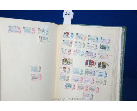 A green Stamp Album, British Empire and Commonwealth collection. Large volume of material with limited picking, many short ru