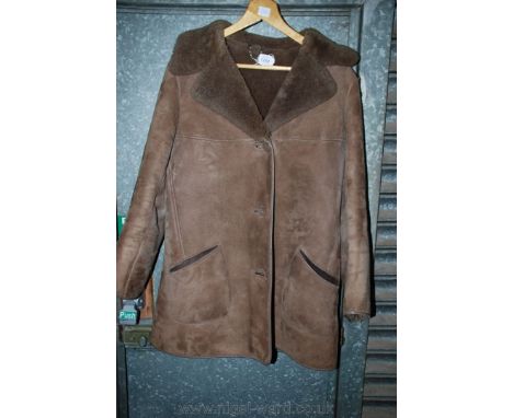 A ladies half length suede sheepskin jacket, light brown by Bayliss & Son, Street, Somerset.