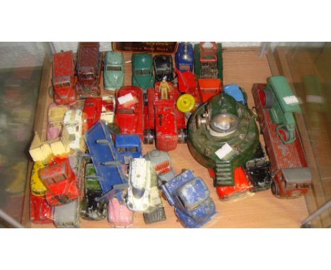 Shelf of vintage Dinky toy cars (Play worn condition)