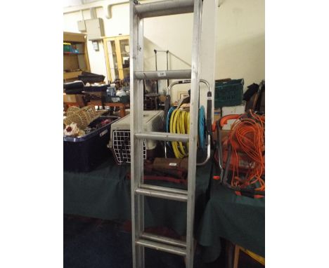 An Extending Aluminium Ladder. 