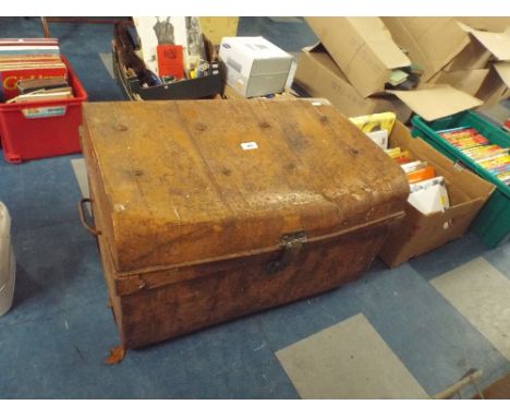 A Tin Travelling Trunk.
