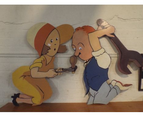 Two Fret Work Wooden Shop Advertising Signs Depicting Kneeling Man with Spanner and Kneeling Woman with Light Bulb.