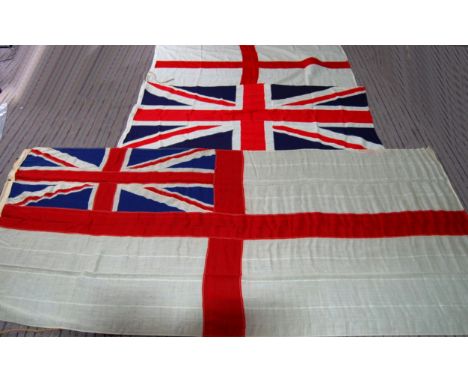 Three vintage 20th century British flags to include; St. George's Cross ( 170cm by 74cm),&nbsp; Union Flag ( 86cm by 75cm) &a