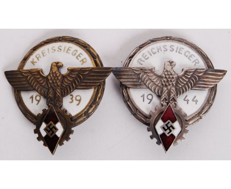 Two 20th century Nazi German Third Reich enamel pin badges to include; Reichssieger 1944 badge & Kreissieger 1939 badge. Both