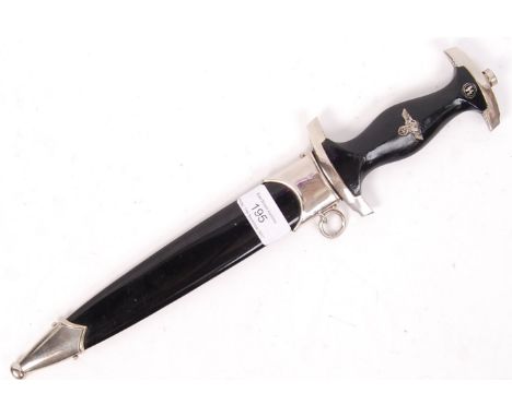 A WWII Second World War type German Third Reich Nazi SS Officers dress dagger. With eagle motif inset to handle, and etched m