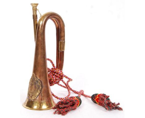 A First World War WWI brass &amp; copper bugle with Argyll &amp; Sutherland Highlanders badge mounted to front. With the orig