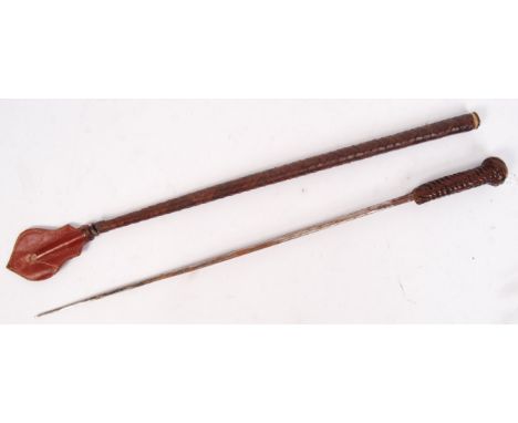 A vintage 20th century metal sword hidden within brown leather horse riding crop. Measures approx 51cm long.&nbsp;