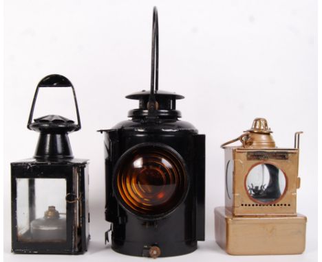A collection of 3x vintage 20th century Railway track side lamps to include; The Adlake Non Sweating #12 Amber Lamp, British 