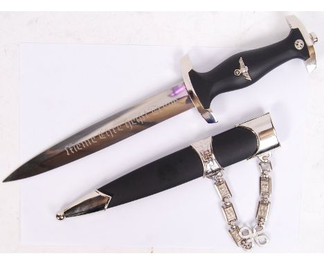 A replica 20th century Third Reich WWII Second World War German SS ceremonial dagger. The blade engraved with motto. Within s