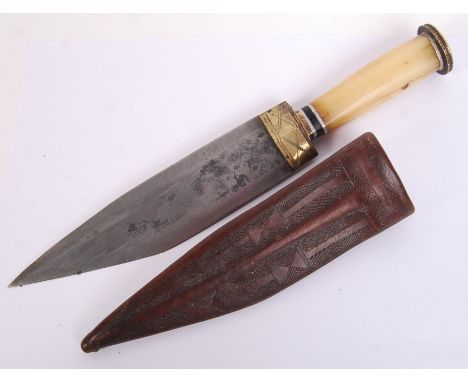 An original WWII Second World War Jordanian / Syrian bone handled dagger. Decoration to handle top &amp; blade top. Within it