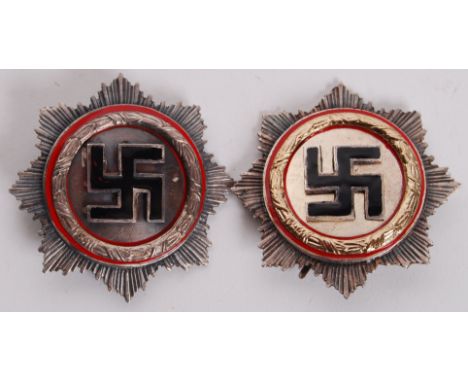 Two 20th century Nazi German Third Reich large swastika star badges with black enamel swastika emblems to front. 'G. Brehmer'