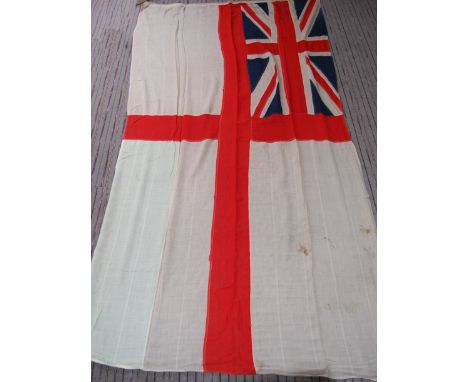 A large vintage 20th century British Royal Navy white ensign flag with the original hoist rope &amp; Inglefield clip. Measure