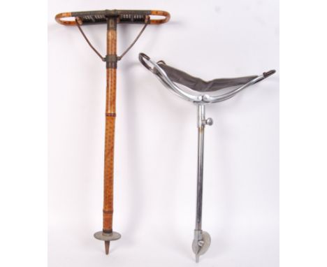 Two vintage shooting sticks one wooden, the other metal. No makers marks present. Both with folding seats to top. Measure app