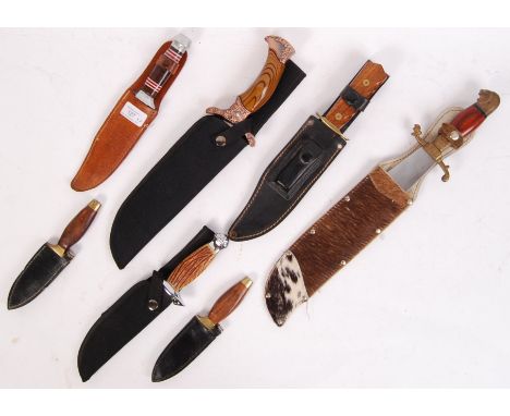 A collection of 7x 20th century army / Bowie knives to include; wooden handled hunting knife, 2x miniature knives, Brazilian 