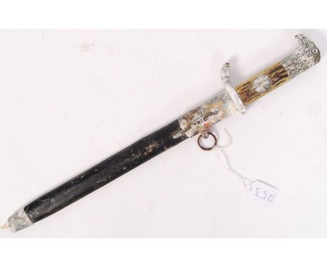 A presumed reproduction 20th century WWII Second World War style German Nazi Third Reich Police parade dagger. White metal hi