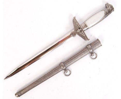 A 20th century reproduction German Nazi Third Reich Government Official's dress dagger. Topped with eagle handle &amp; Nazi R