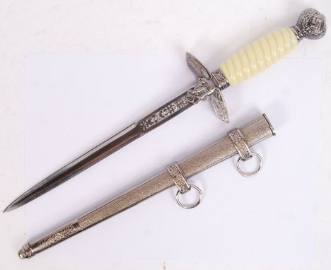 A replica 20th century WWII Second World War Nazi German Third Reich Luftwaffe Officers dagger with decorative blade. Within 
