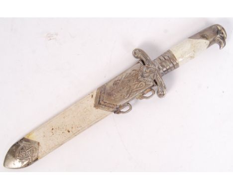 A reproduction 20th century WWII Second World War style German Nazi Third Reich parade dagger. White metal hilt, with eagle h
