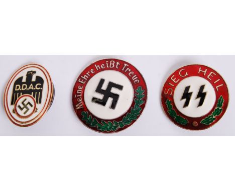 A collection of 3x 20th century replica Third Reich Nazi Party decorative enamel badges to include; Sieg Heil SS, D.D.A.C & M