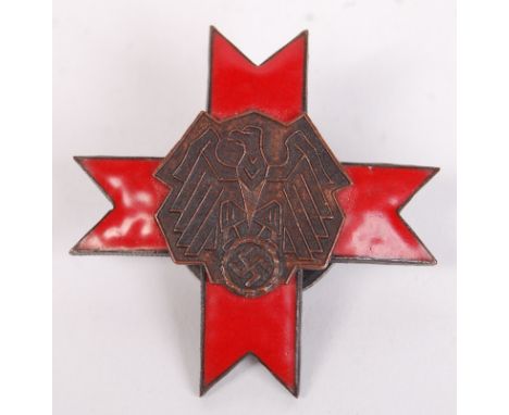 An unusual original WWII Second World War Third Reich Nazi badge / medal. Depicting a stylized eagle to centre atop a swastik