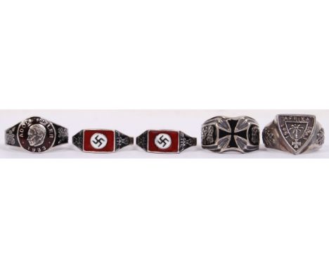 A collection of 5x 'fantasy piece' Third Reich Nazi rings to include; 2x enamel swastika emblem rings, Iron Cross emblem ring