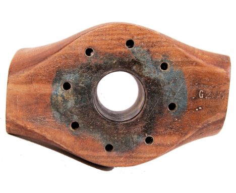 A presumed Second World War WWII&nbsp;wooden aircraft propeller hub with seven drilled bolt holes around centre ring. 'G237' 