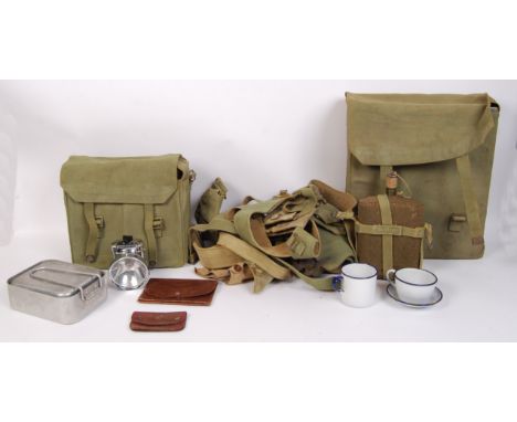 A collection of assorted WWII Second World War military items comprising of webbing, mess tin, Czechoslovakian enamel mug wit