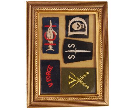 A collection of 5x assorted vintage British military commando patches / badges to include ' V. Force' ' SS ' and others. Fram