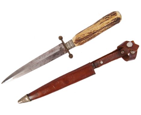 An early to mid 20th century German Solingen hunting knife within its original leather scabbard. ' Solingen Germany ' engrave