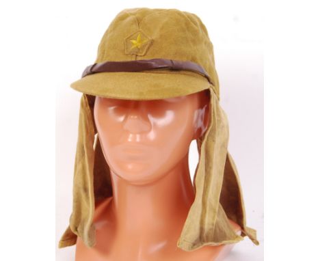 An original WWII Second World War Japanese Army wool cap with neck flaps &amp; star to front.&nbsp;