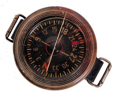 An original vintage WWII Second World War Nazi German Luftwaffe aircrew wrist compass. Makers marks and serial numbers to rev
