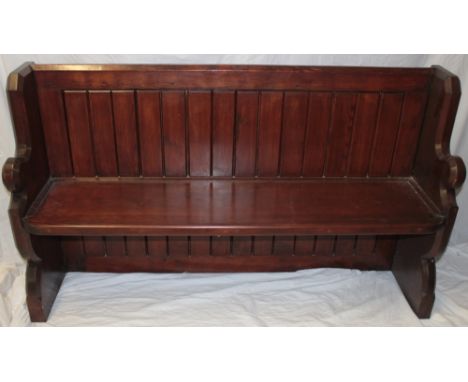 An old pitch pine rectangular pew/hall bench with panelled back on standard supports 58" long 