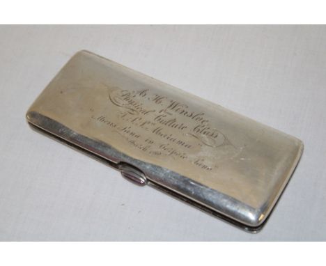 A good quality George V sterling silver rectangular twin section visiting card case with engraved presentation text dated 191