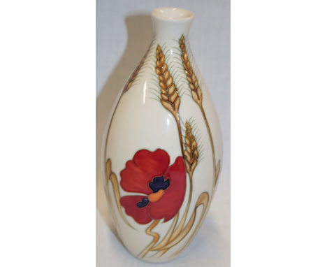 A Moorcraft pottery tapered vase with poppy and wheat sheaf decoration on cream ground 9½" high and a damaged Moorcraft recta