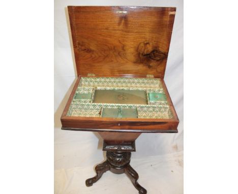 A Victorian inlaid burr walnut rectangular work table with lined and fitted interior enclosed by a hinged cover on tapered ca