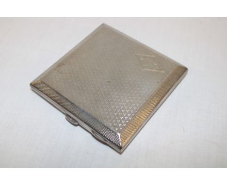 A George V silver rectangular cigarette case with engine-turned decoration, Birmingham marks 1926 