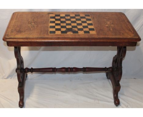 A Victorian inlaid walnut rectangular occasional table with inset chess board top and floral decoration on pierced supports, 