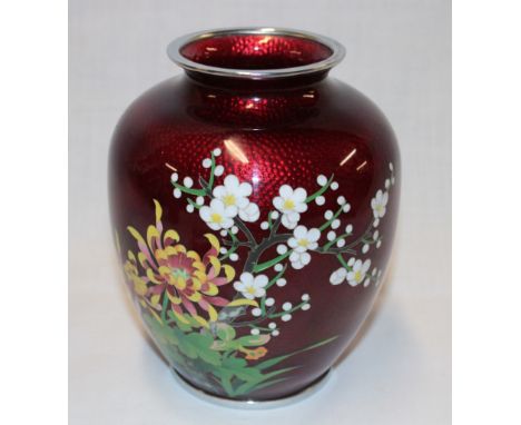 A Japanese cloisonne enamelled tapered vase with blossom decoration on red ground, 6½" high 