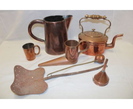 A 19th Century copper tapered jug with loop handle, copper and iron milk skimmer, a copper ale warmer with loop handle, tanka