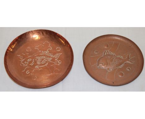 Two Newlyn copper circular dishes decorated in relief with fish 5" and 5½" diameter 